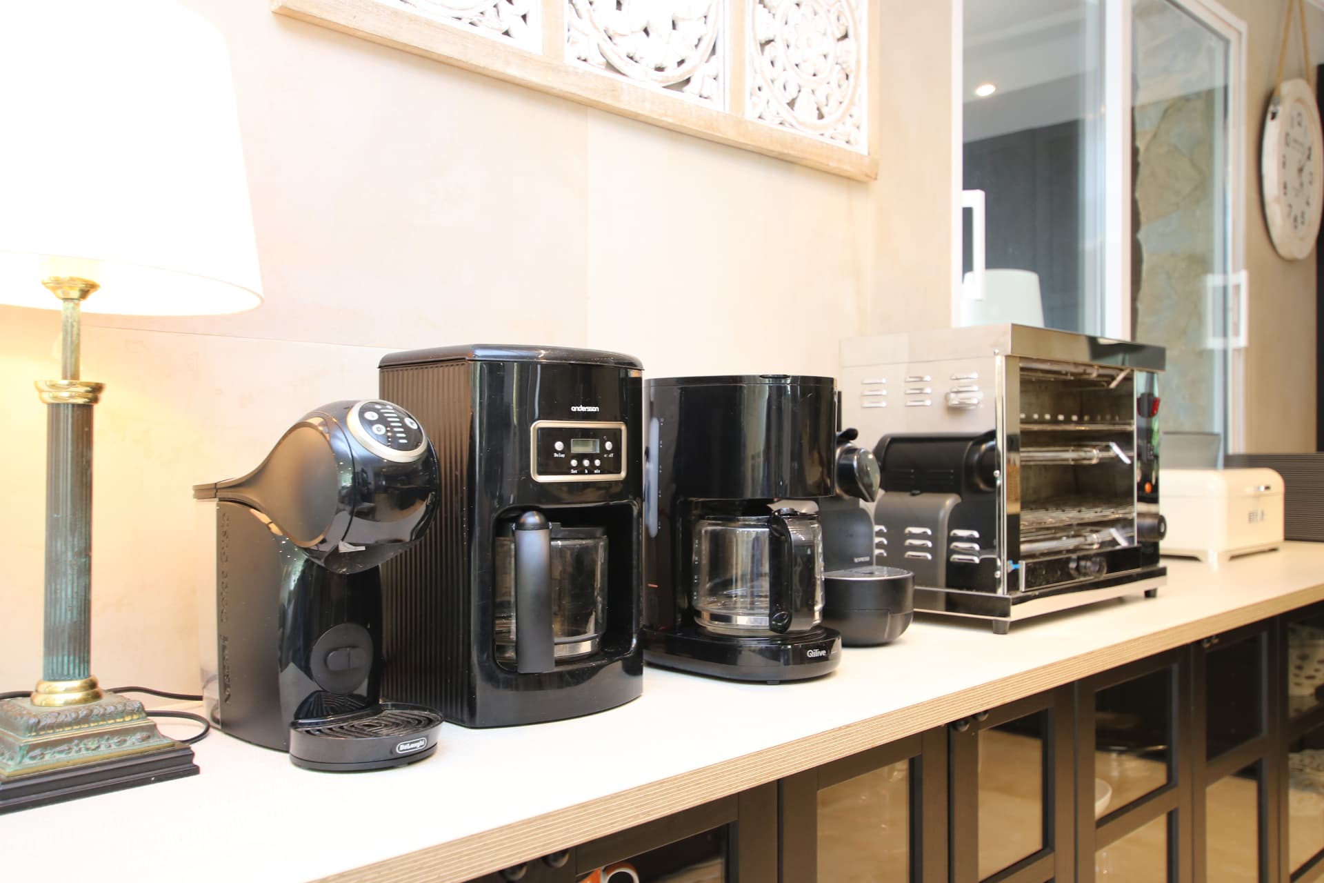 Coffee and breakfast equipment along the kitchen service counter