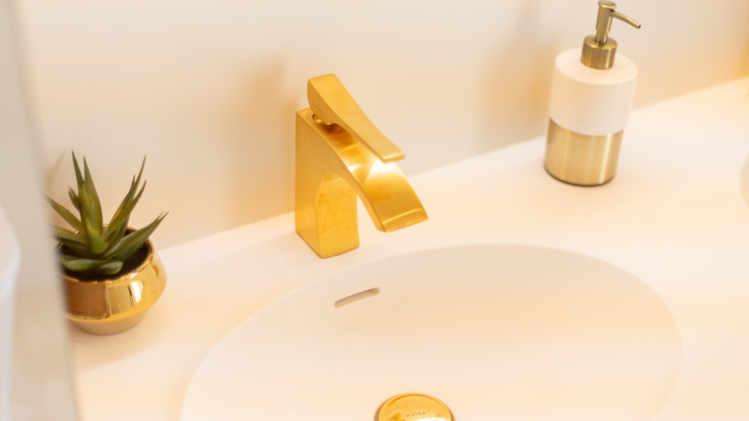 A guest bathroom finished in gold
