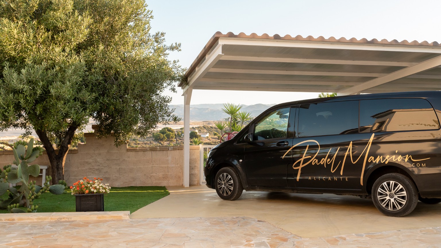 The PadelMansion van used for airport transfers and local transport